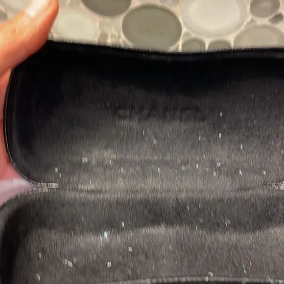 Chanel black leather quilted sunglass case. No sunglasses just the case